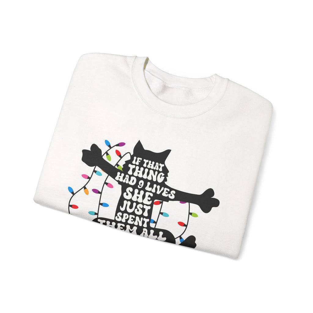 Cat Christmas Sweatshirt — "If That Thing Had 9 Lives She Just Spent Them All" Holiday Crewneck