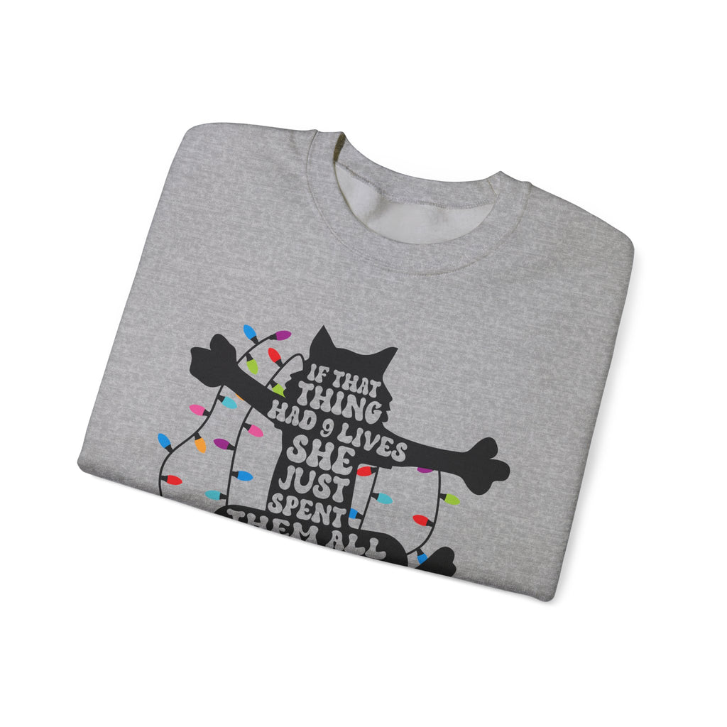 Cat Christmas Sweatshirt — "If That Thing Had 9 Lives She Just Spent Them All" Holiday Crewneck